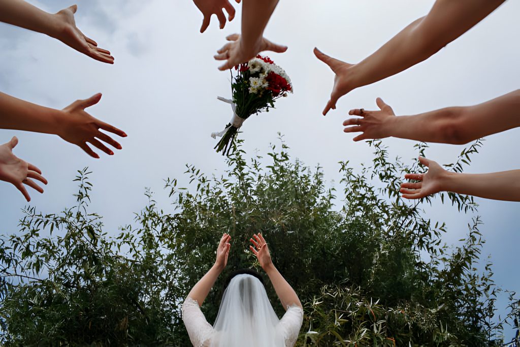 what does it mean when you catch the flowers at a wedding